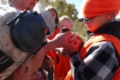matt-cahoon-showing-kids-a-bird-